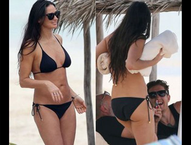 Demi  fue fotografiada junto a un joven durante sus vacaciones en México.