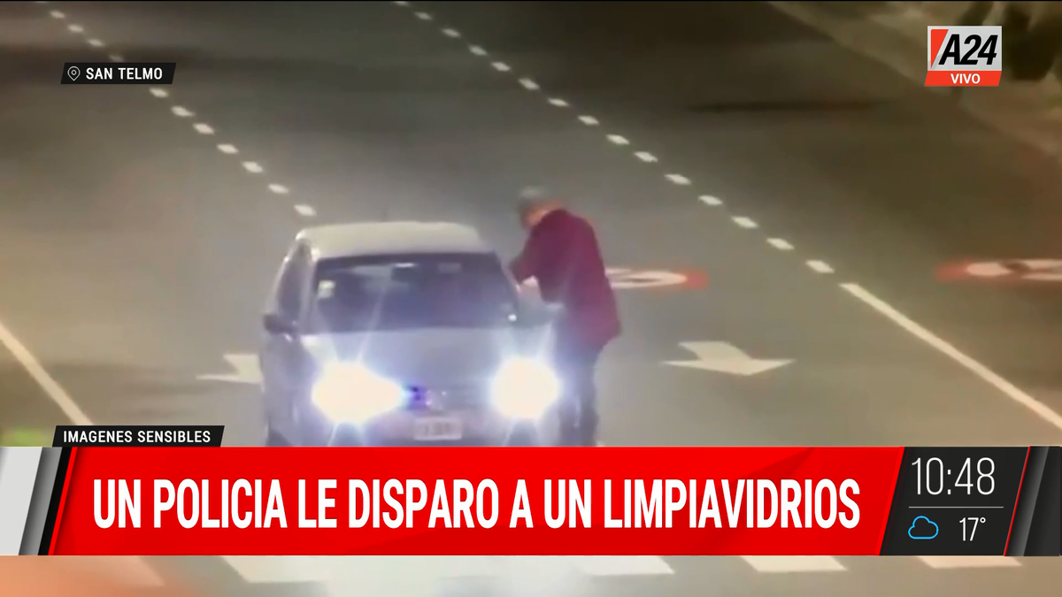 Así le disparó un policía a un limpiavidrios en la av. 9 de Julio (Foto: captura de TV).