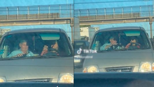 La grabaron brindando con un champagne en la autopista mientras manejaba