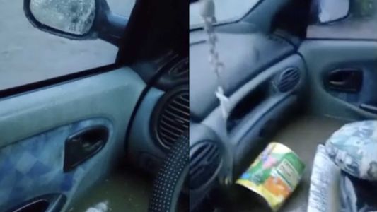 El desesperante pedido de auxilio de una mujer atrapada en su auto en medio del agua: ¡Dios, ayudame!