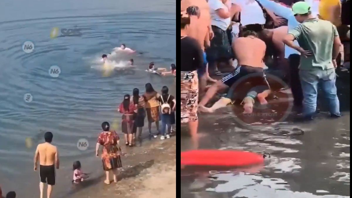 El momento de la tragedia en el bautismo. La persona se hunde porque no sabía nadar. Lo rescataron y le dieron los primeros auxilios de reanimación en la costa, pero no pudieron salvarlo. (Foto: Captura deTV)
