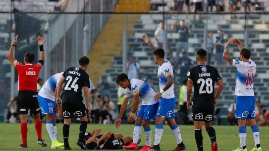 Escándalo en el fútbol chileno: suspendieron el clásico por un petardo que golpeó a Blandi