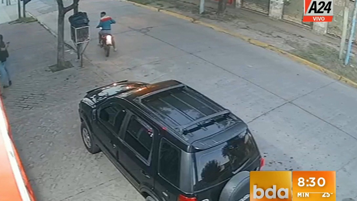El momento en que la mujer le dispara a los atacantes (Foto: captura de video). El momento en que la mujer le dispara a los atacantes (Foto: captura de video).