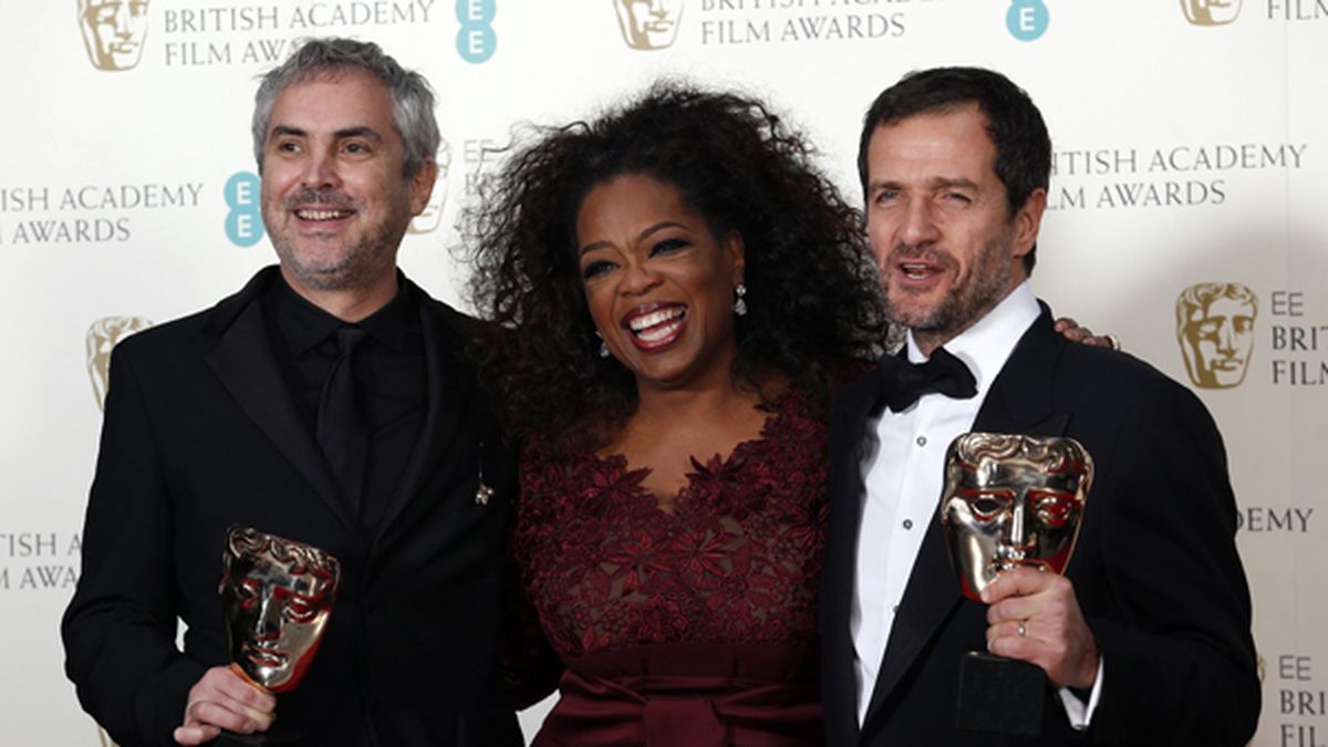 Imparable. Alfonso Cuarón, por “Gravedad”, junto a Oprah Winfrey.