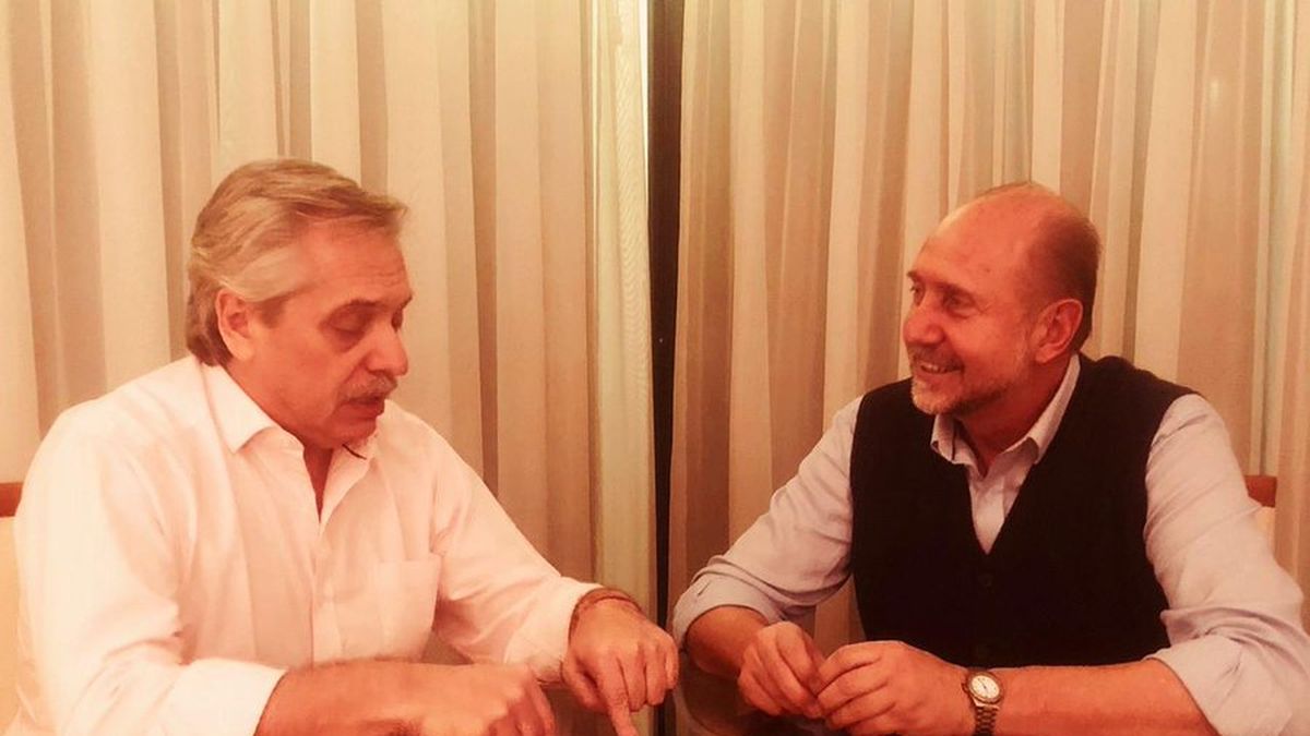 Alberto Fernández con Omar Perotti en 2019
