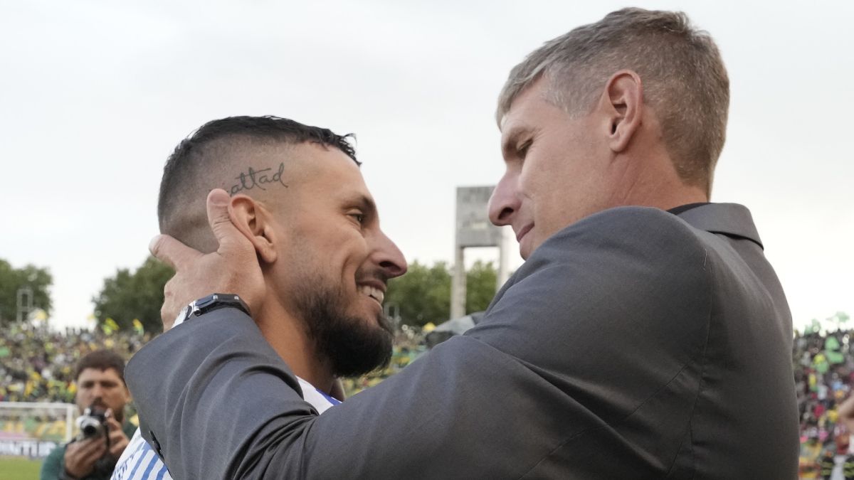 Benedetto y Palermo se abrazaron en la previa.