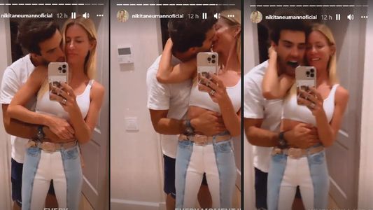 Nicole Neumann y Manu Urcera, caricias y besos frente al espejo