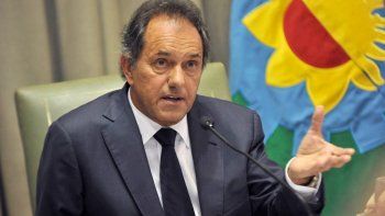 Denuncian que Scioli utilizó dinero destinado a concientizar sobre el cambio climático para imprimir boletas de campaña