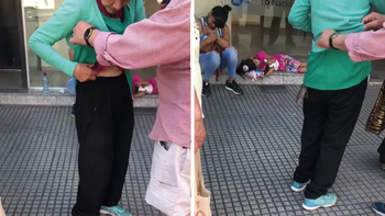 ¡La peor pesadilla! Se le metió una rata por la ropa mientras esperaba en la cola del banco