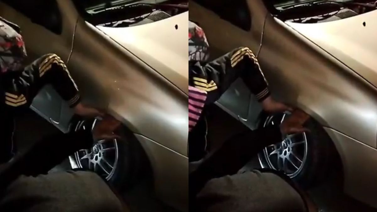 Intentaban robar una rueda y el auto los aplastó. (Foto: captura de video)