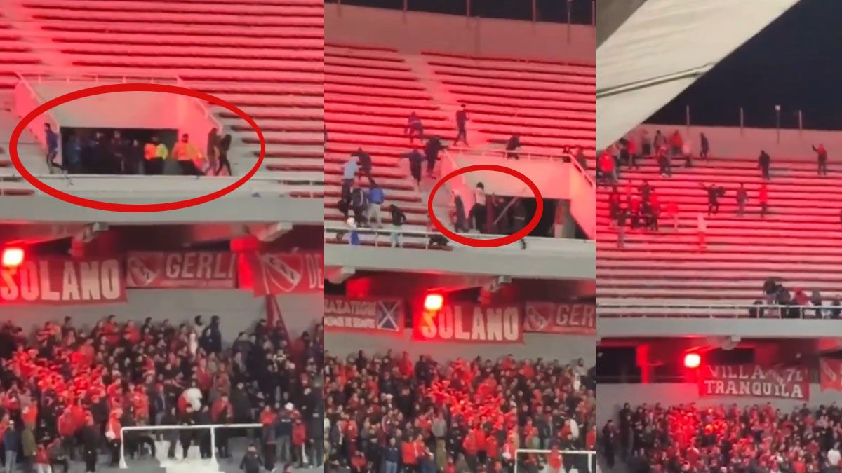 La secuencia de la violencia en la tribuna alta de Independiente. El momento en que llegan los hinchas de independiente al sector en que estaba los de la U. de Chile. Uno de ellos, ya aparece en el lugar con un palo en sus manos. La barra de independiente se dirigió a la esquina de la tribuna donde los hinchas chilenos iniciaron la violencia. (Foto: A24.com)