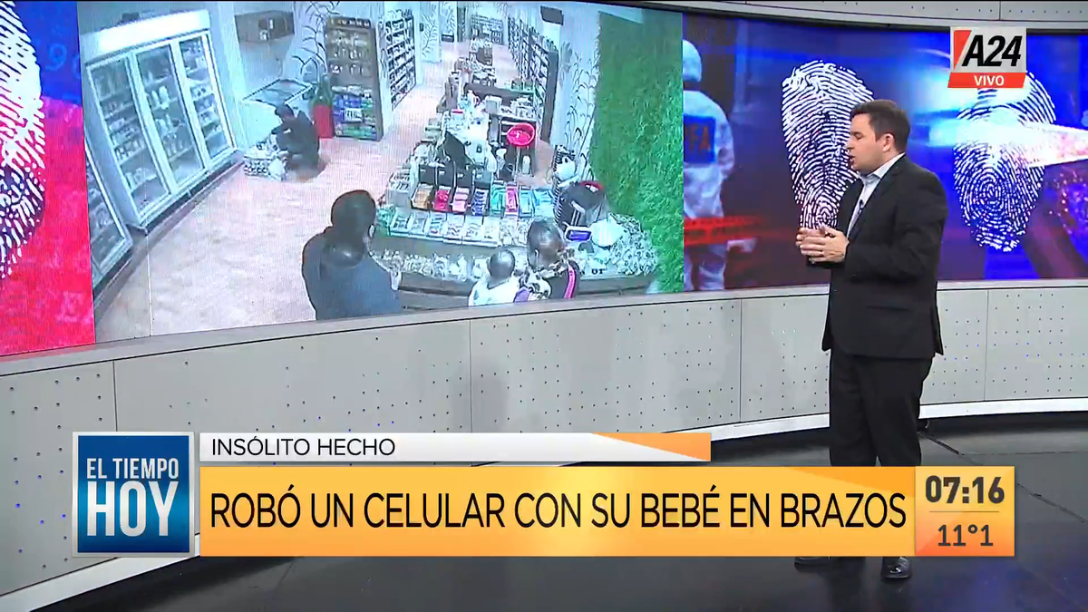 Así una mujer robó un celular con su bebé en brazos. (Captura de Tv)