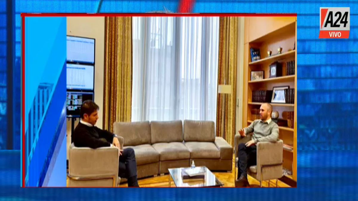 Martín Guzmán y Axel Kicillof, reunidos en el despacho principal del ministerio de Economía. (Foto: Captura de TV)