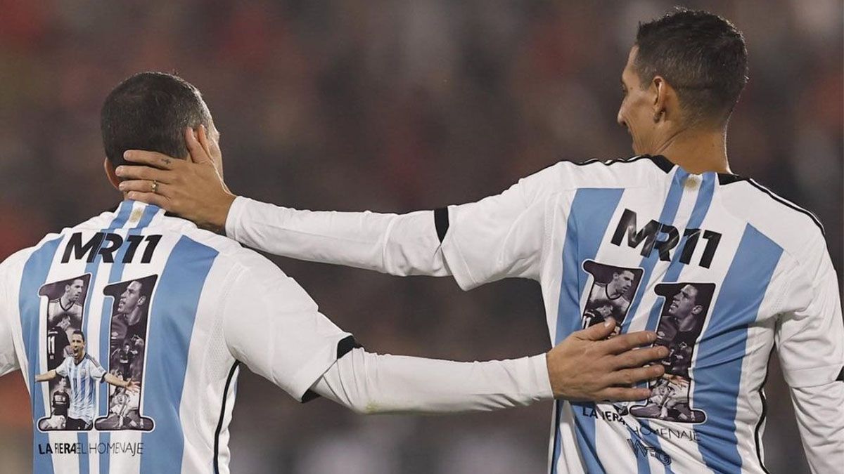 Maxi Rodríguez y Ángel Di María