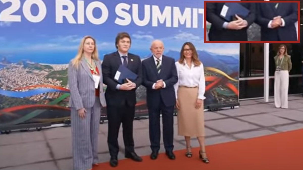 Las manos de Milei, con una carpeta. Las de Lula, entrelazadas. Ningún punto de contacto. (Captura de TV)